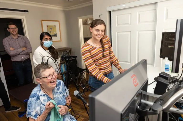 Brain-computer interface technology has allowed Pat Bennett (seated) to regain his ability to speak. Photo credit: Steve Fisch/ Stanford University School of Medicine